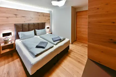 Ein Bett oder Betten in einem Zimmer der Unterkunft Bergkind