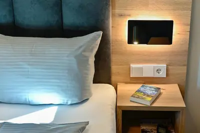 Ein Bett oder Betten in einem Zimmer der Unterkunft Bergkind