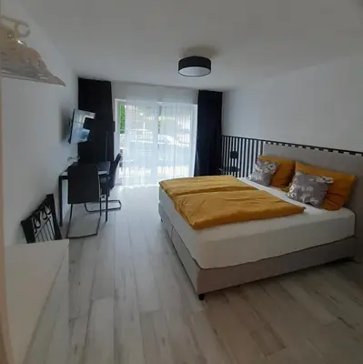 Ein Bett oder Betten in einem Zimmer der Unterkunft Apartment Kampenwand