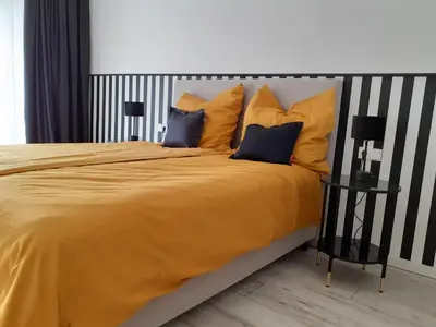 Ein Bett oder Betten in einem Zimmer der Unterkunft Apartment Kampenwand