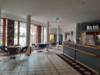 Ein Sitzbereich in der Unterkunft Apartment Kampenwand