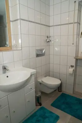 Ein Badezimmer in der Unterkunft FeWo Waldi am Kurpark