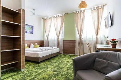 Ein Bett oder Betten in einem Zimmer der Unterkunft Apartimo Altdorf