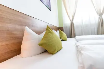 Ein Bett oder Betten in einem Zimmer der Unterkunft Apartimo Altdorf