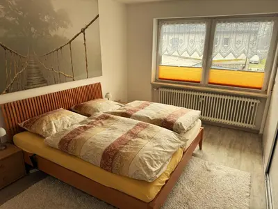 Ein Bett oder Betten in einem Zimmer der Unterkunft Ferienwohnung Lachmayr