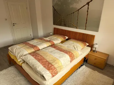 Ein Bett oder Betten in einem Zimmer der Unterkunft Ferienwohnung Lachmayr