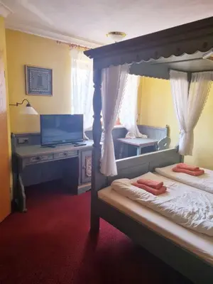 Ein Bett oder Betten in einem Zimmer der Unterkunft Kleines Brauhaus Ingolstadt