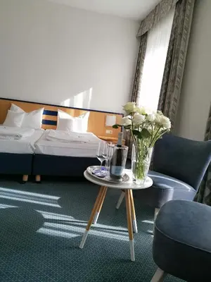 Ein Bett oder Betten in einem Zimmer der Unterkunft Hotel Wendelstein