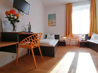 Ein Bett oder Betten in einem Zimmer der Unterkunft Hotel Wendelstein