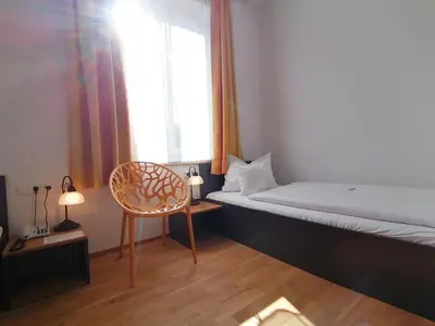 Ein Bett oder Betten in einem Zimmer der Unterkunft Hotel Wendelstein