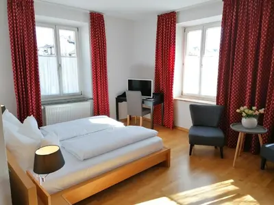 Ein Bett oder Betten in einem Zimmer der Unterkunft Hotel Wendelstein