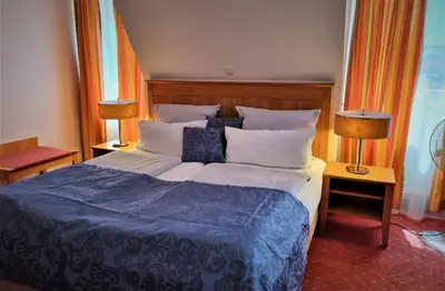 Ein Bett oder Betten in einem Zimmer der Unterkunft myMINGA4 - Hotel & serviced Apartments