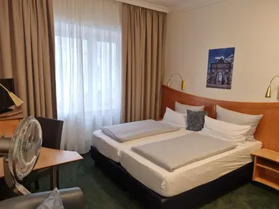 Ein Bett oder Betten in einem Zimmer der Unterkunft myMINGA4 - Hotel & serviced Apartments