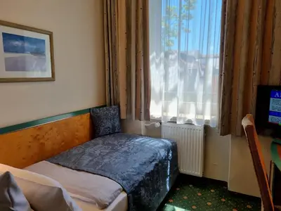 Ein Bett oder Betten in einem Zimmer der Unterkunft myMINGA4 - Hotel & serviced Apartments