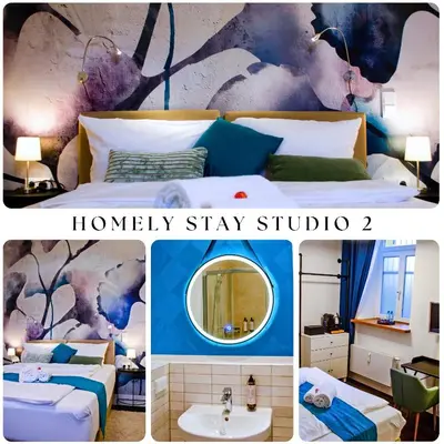 Ein Bett oder Betten in einem Zimmer der Unterkunft HOMELY STAY Studio 2 - Modern Self-Check-In room in Munich
