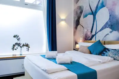 Ein Bett oder Betten in einem Zimmer der Unterkunft HOMELY STAY Studio 5 - Trendy Self-Check-In Stay in Munich