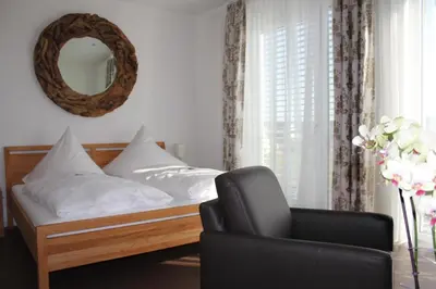 Ein Bett oder Betten in einem Zimmer der Unterkunft Das Quartier