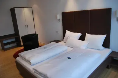 Ein Bett oder Betten in einem Zimmer der Unterkunft Das Quartier