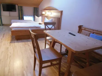 Ein Bett oder Betten in einem Zimmer der Unterkunft Gasthof Pension Altwirt