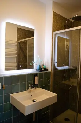 Ein Badezimmer in der Unterkunft HOMELY STAY Studio 9 - Stylish & Convenient Self-Check-In Studio in Munich