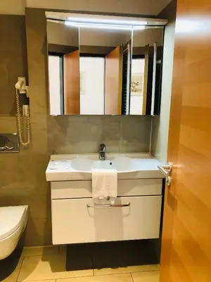 Ein Badezimmer in der Unterkunft Hotel Verdi