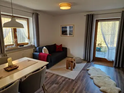 Ein Sitzbereich in der Unterkunft Ferienwohnung Murmeltier