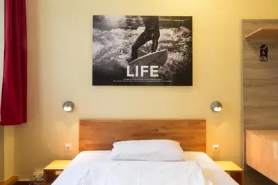 Ein Bett oder Betten in einem Zimmer der Unterkunft Euro Youth Hotel Munich