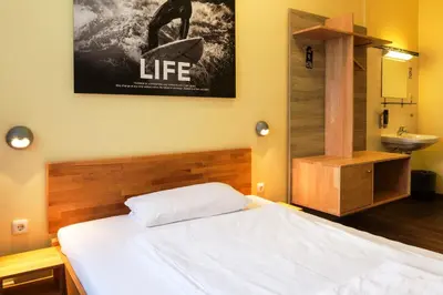 Ein Bett oder Betten in einem Zimmer der Unterkunft Euro Youth Hotel Munich