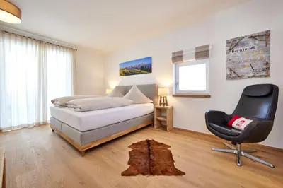Ein Bett oder Betten in einem Zimmer der Unterkunft BergJuwel