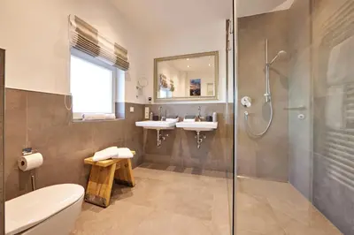 Ein Badezimmer in der Unterkunft BergJuwel