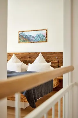 Ein Bett oder Betten in einem Zimmer der Unterkunft Hirsch