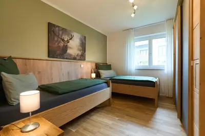Ein Bett oder Betten in einem Zimmer der Unterkunft Gipfelglück-Garmisch