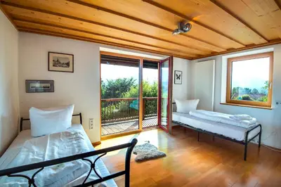 Ein Bett oder Betten in einem Zimmer der Unterkunft Künstlervilla mit grandiosem Panoramablick