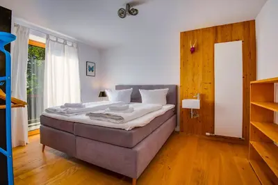 Ein Bett oder Betten in einem Zimmer der Unterkunft Künstlervilla mit grandiosem Panoramablick