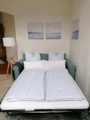 Ein Bett oder Betten in einem Zimmer der Unterkunft Ferienwohnung Stöckl
