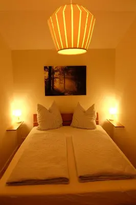 Ein Bett oder Betten in einem Zimmer der Unterkunft Ferienwohnung Stöckl