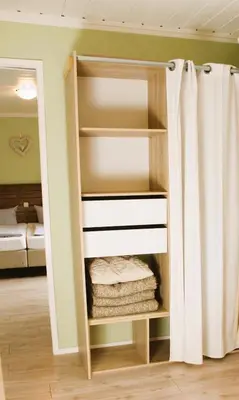 Ein Bett oder Betten in einem Zimmer der Unterkunft ARRIVEL Pension Haus am Bach