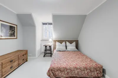 Ein Bett oder Betten in einem Zimmer der Unterkunft Villa Riedhof
