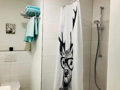 Ein Badezimmer in der Unterkunft Hirschzimmer & Strandzimmer