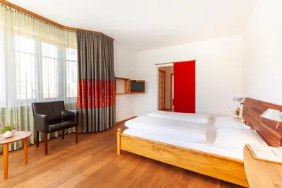 Ein Bett oder Betten in einem Zimmer der Unterkunft Bio-Hotel Alter Wirt