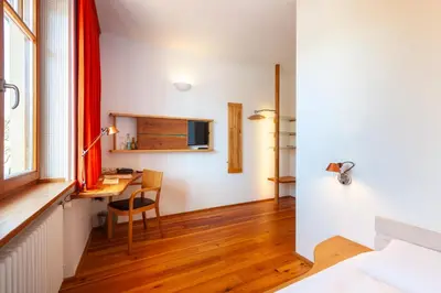 Ein Bett oder Betten in einem Zimmer der Unterkunft Bio-Hotel Alter Wirt