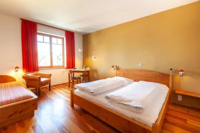 Ein Bett oder Betten in einem Zimmer der Unterkunft Bio-Hotel Alter Wirt
