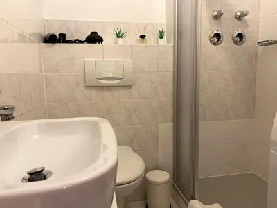 Ein Badezimmer in der Unterkunft Seeuferresidenz am Adrian Stoop NEU eingerichtet