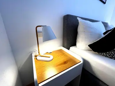 Ein Bett oder Betten in einem Zimmer der Unterkunft Seeuferresidenz am Adrian Stoop NEU eingerichtet