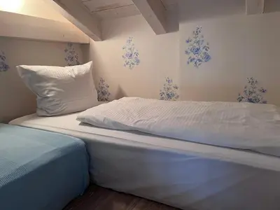 Ein Bett oder Betten in einem Zimmer der Unterkunft Garmisch Lux Apartment mit Sauna