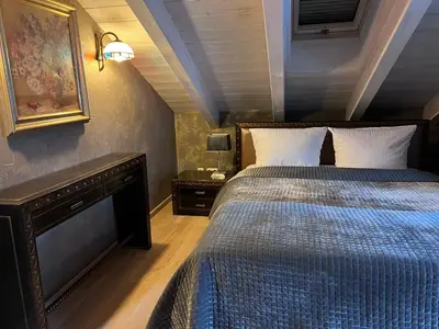 Ein Bett oder Betten in einem Zimmer der Unterkunft Garmisch Lux Apartment mit Sauna