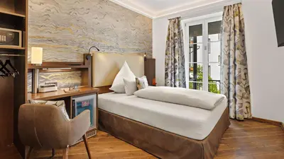 Ein Bett oder Betten in einem Zimmer der Unterkunft Hotel Deutsche Eiche