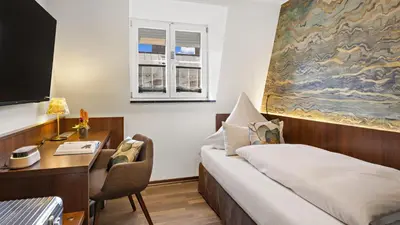 Ein Bett oder Betten in einem Zimmer der Unterkunft Hotel Deutsche Eiche