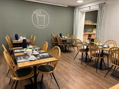 Ein Restaurant oder anderes Speiselokal in der Unterkunft Hotel Bastei