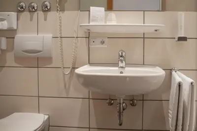 Ein Badezimmer in der Unterkunft Hotel Bastei